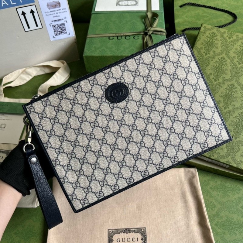 G*u*i clutch bags